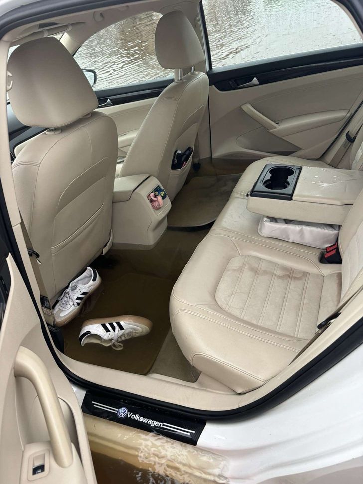 Interior of a flooded vehicle in Clearspring Greens, Steinbach 