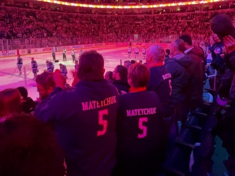 Many local fans wear Mateychuk jerseys