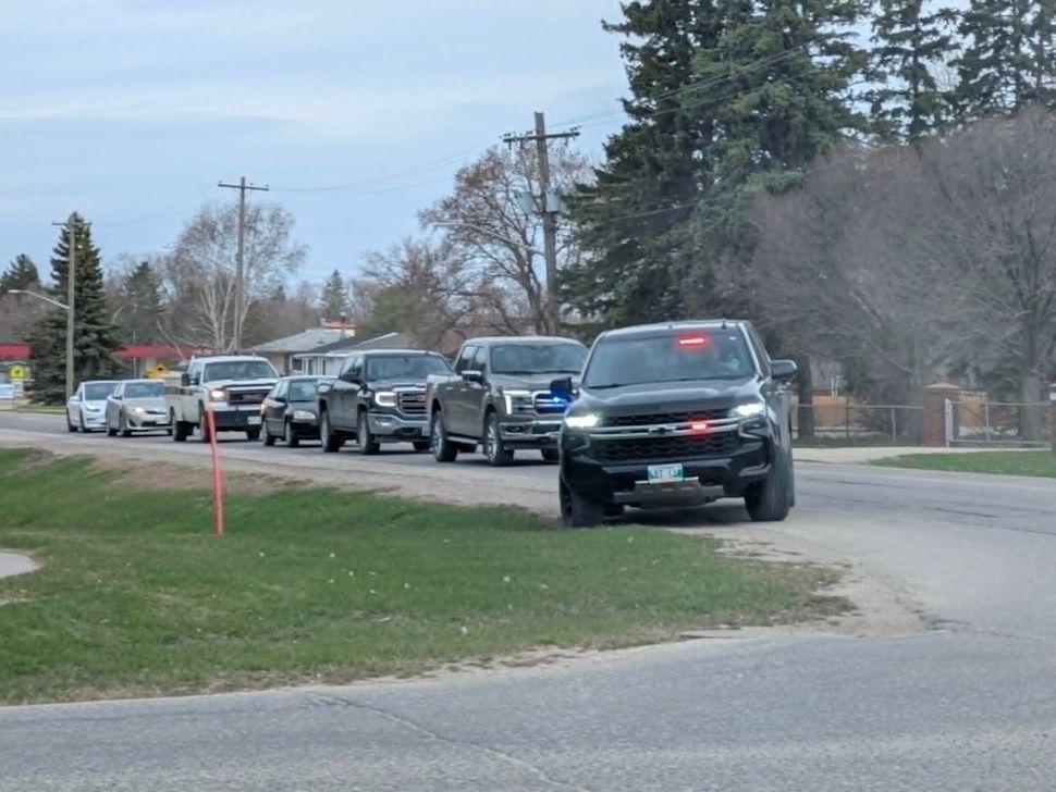 A line of vehicles builds near the scene of a motor vehicle accident on the south bypass in Portage la Prairie on Monday, May 11, as traffic was briefly detoured through the city before the roadway was reopened. PortageOnline/Mike Blume