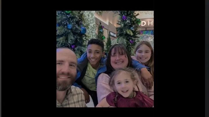 Danielle and John Losier with their children in a family photo taken before a Jan. 26 fire destroyed their home north of Cochrane. Photo / GoFundMe