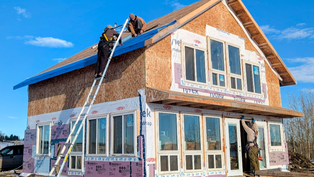 The Losier family home under construction north of Cochrane prior to the Jan. 26 fire. Much of the structure was built using second-hand materials sourced privately. Photo / GoFundMe