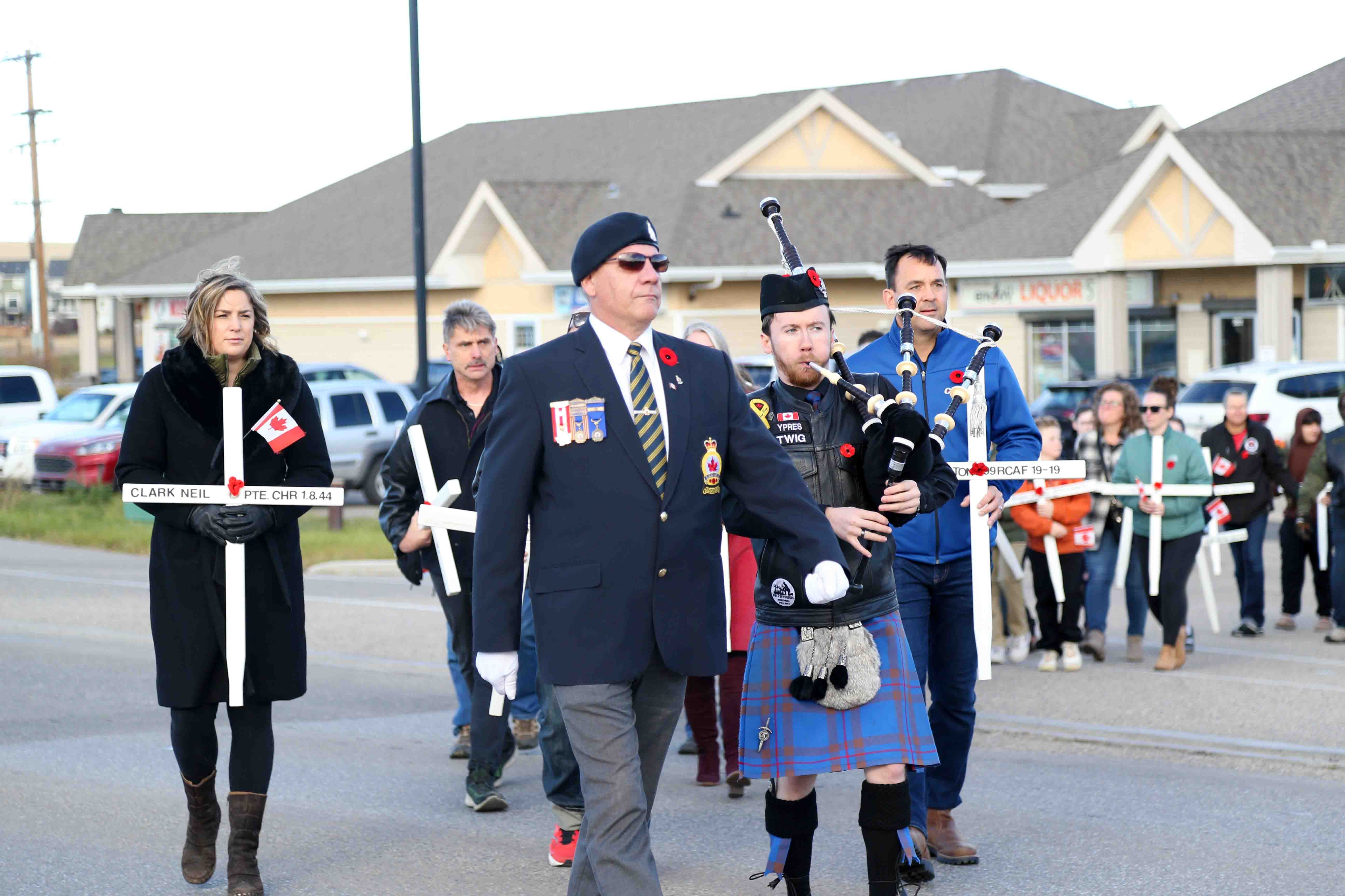 On Saturday, Airdronians joined the annual Memorial Cross Ceremony on Veterans Boulevard and placed crosses in memory of veterans. The event began with a convoy of motorcycles driving through the city and eventually stopping on Veterans Boulevard. (Photo by Anna Ferensovich)