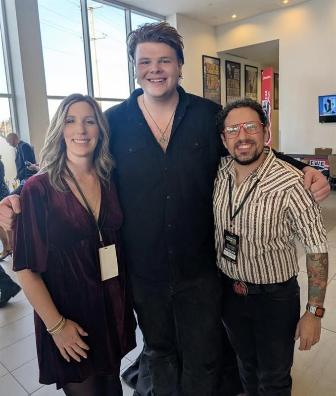 Braydon King with Eric and Lauren