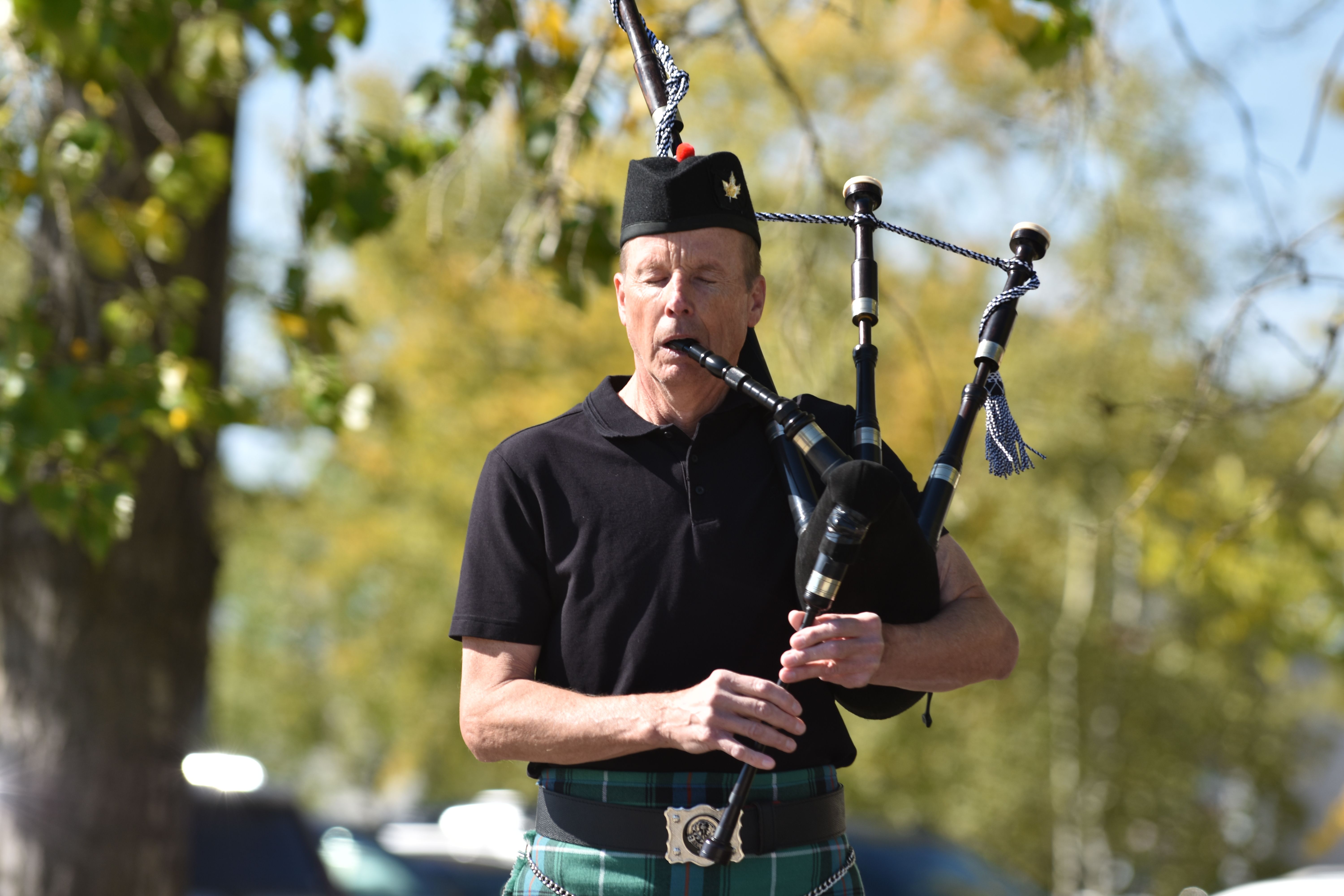 A piper performs on stage during the Highwood Highland Showcase at the Bob Snodgrass Recreation Complex.