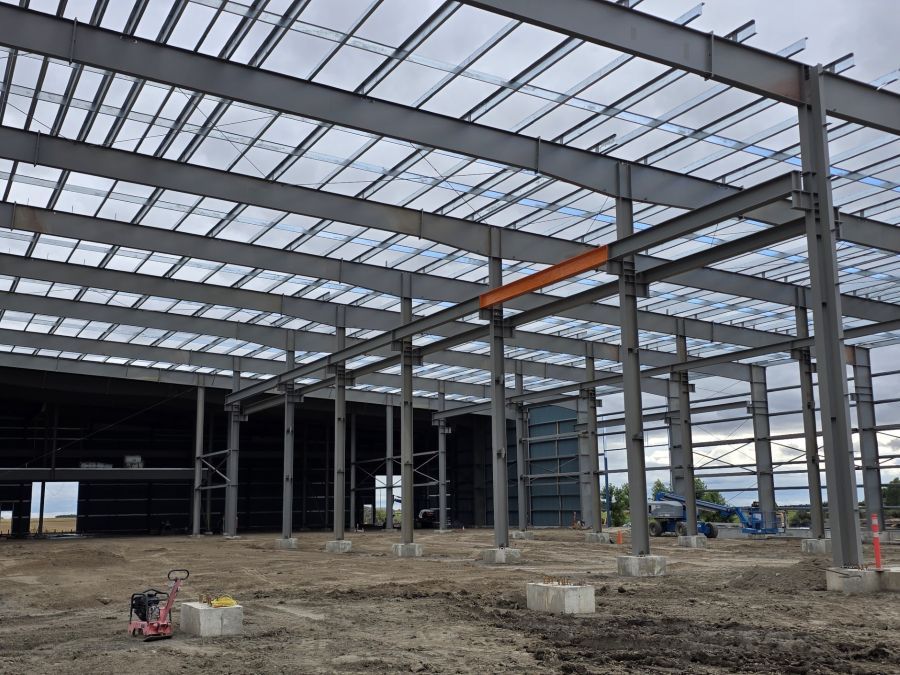 an orange beam in a building under construction