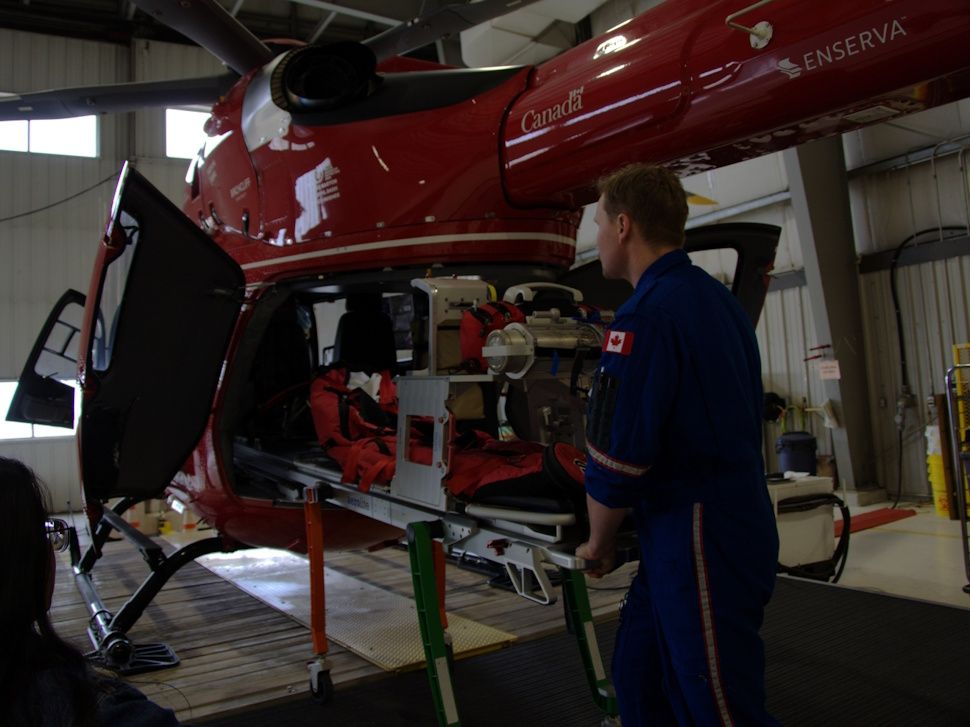 a man stands at STARS helicopter